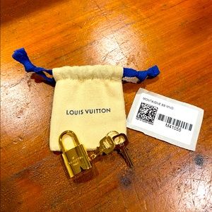 Louis Vuitton Lock, key and dust bag